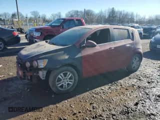 2012 Chevrolet Sonic LT с VIN 1G1JD6SH8C4164164, выставлен на аукционе Copart как лот 42919995 с пробегом Не указан миль и Списание • Salvage title. История ставок и продаж доступна на DreamBid. Изображение 1.