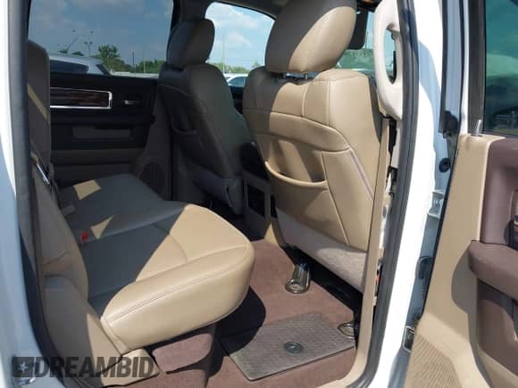 2012 Ram 1500 Laramie z VIN 1C6RD6NT9CS282026, wystawiony jako IAAI lot #43351784 z przebiegiem 183 016 mil mil oraz . Historia ofert i sprzedaży dostępna na DreamBid. Obrazek 8.