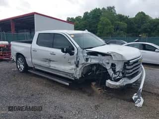 2023 Chevrolet Silverado 1500 High Country with VIN 1GCUDJEL8PZ243348, listed as a IAAI auction lot 40047595 with 18,797 mi miles and . Bid and sale history available at DreamBid. Image 1.