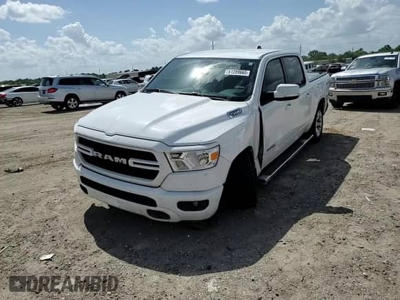 2020 Ram 1500 Lone Star with VIN 1C6RREFM0LN245982, listed as a Copart auction lot 61289665 with 97,036 mi miles and Salvage title. Bid and sale history available at DreamBid. Image 13.