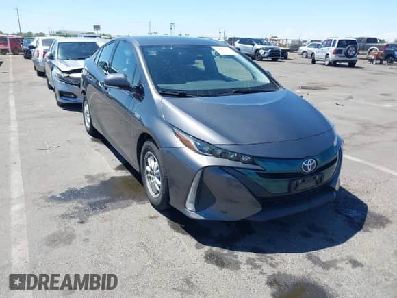 2018 Toyota Prius Plus z VIN JTDKARFP3J3073801, wystawiony jako IAAI lot #42903373 z przebiegiem 90 429 mil mil oraz . Historia ofert i sprzedaży dostępna na DreamBid. Obrazek 1.
