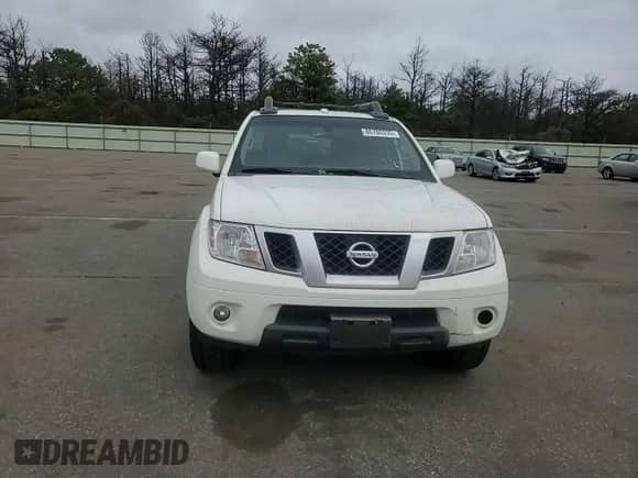 2013 Nissan Frontier Pro-4X z VIN 1N6AD0EVXDN754915, wystawiony jako Copart lot #86780335 z przebiegiem 168 487 mil mil oraz Szkoda całkowita • Salvage title. Historia ofert i sprzedaży dostępna na DreamBid. Obrazek 13.