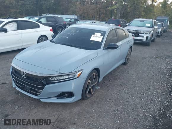 2022 Honda Accord Sport z VIN 1HGCV1F31NA055615, wystawiony jako IAAI lot #42247192 z przebiegiem 33 044 mil mil oraz . Historia ofert i sprzedaży dostępna na DreamBid. Obrazek 2.