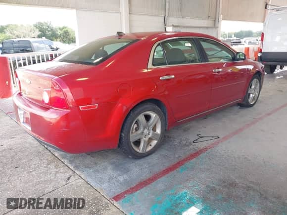 2012 Chevrolet Malibu 1LT z VIN 1G1ZC5E03CF284982, wystawiony jako IAAI lot #43379149 z przebiegiem 200 196 mil mil oraz . Historia ofert i sprzedaży dostępna na DreamBid. Obrazek 4.