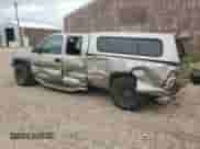 1999 Chevrolet Silverado 1500 LS z VIN 2GCEK19V1X1142506, wystawiony jako Copart lot #69878094 z przebiegiem 87 683 mil mil oraz Czysty tytuł • Clean title. Historia ofert i sprzedaży dostępna na DreamBid. Obrazek 2.