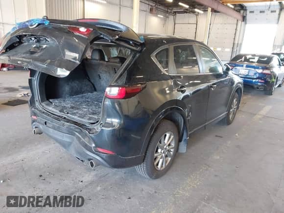 2024 Mazda CX-5 S Preferred z VIN JM3KFBCL3R0490818, wystawiony jako IAAI lot #43044758 z przebiegiem 12 065 mil mil oraz . Historia ofert i sprzedaży dostępna na DreamBid. Obrazek 4.