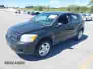 2009 Dodge Caliber SXT with VIN 1B3HB48A59D183646, listed as a IAAI auction lot 43048308 with 152,808 mi miles and . Bid and sale history available at DreamBid. Image 21.
