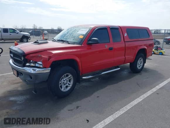 2003 Dodge Dakota с VIN 1D7HG42X93S296117, выставлен на аукционе IAAI как лот 42045149 с пробегом 161 725 миль миль и . История ставок и продаж доступна на DreamBid. Изображение 17.