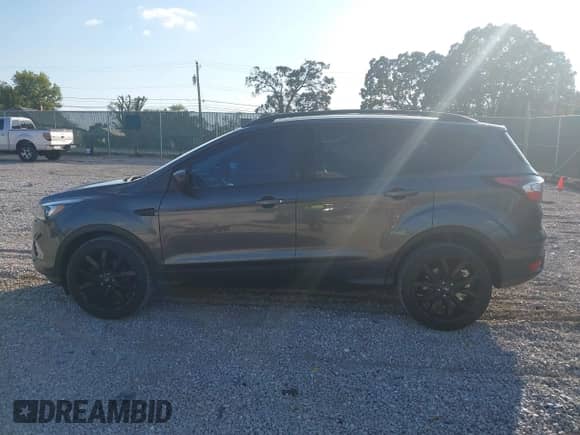 2018 Ford Escape SE с VIN 1FMCU9GDXJUB07285, выставлен на аукционе IAAI как лот 43386823 с пробегом 176 269 миль миль и . История ставок и продаж доступна на DreamBid. Изображение 14.