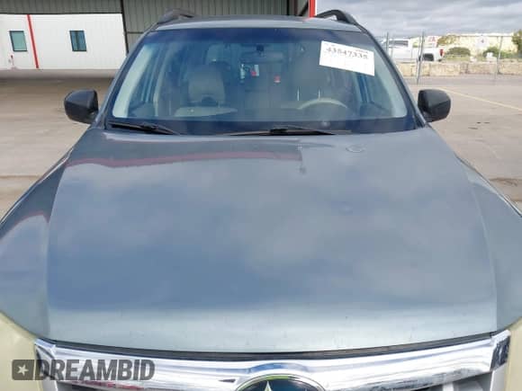 2011 Subaru Forester X with VIN JF2SHBBC8BH724058, listed as a IAAI auction lot 43547335 with 183,923 mi miles and . Bid and sale history available at DreamBid. Image 6.