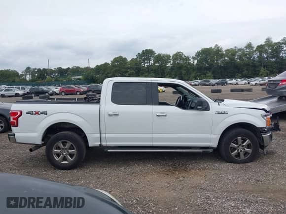 2019 Ford F-150 XLT с VIN 1FTEW1EP8KFA48703, выставлен на аукционе IAAI как лот 43274668 с пробегом 77 075 миль миль и . История ставок и продаж доступна на DreamBid. Изображение 13.