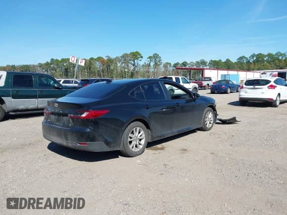 2025 Toyota Camry SE with VIN 4T1DAACK2SU054425, listed as a IAAI auction lot 43540854 with 42,914 mi miles and . Bid and sale history available at DreamBid. Image 4.