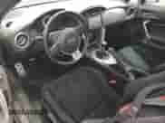 2016 Scion FR-S с VIN JF1ZNAA15G9702106, выставлен на аукционе Copart как лот 52070575 с пробегом 77 221 миль миль и Чистый • Clean title. История ставок и продаж доступна на DreamBid. Изображение 8.