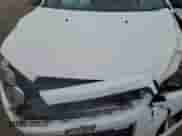 2014 Chevrolet Sonic LT z VIN 1G1JD6SB0E4151729, wystawiony jako Copart lot #81649064 z przebiegiem Nie podano mil oraz Szkoda całkowita • Salvage title. Historia ofert i sprzedaży dostępna na DreamBid. Obrazek 12.