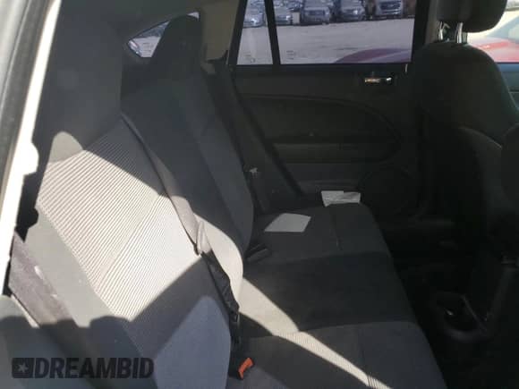 2010 Dodge Caliber SXT с VIN 1B3CB4HA6AD619399, выставлен на аукционе Copart как лот 75840734 с пробегом 206 834 миль миль и Чистый • Clean title. История ставок и продаж доступна на DreamBid. Изображение 10.