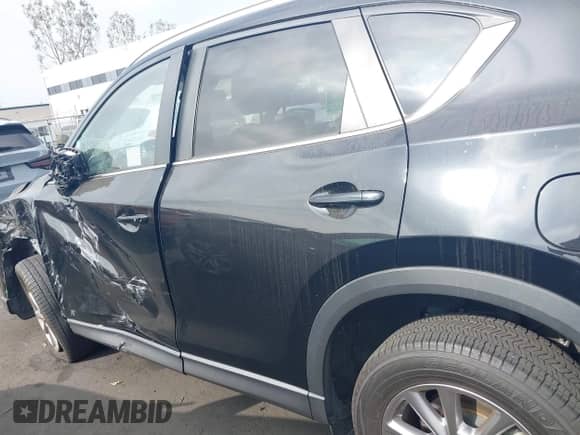 2023 Mazda CX-5 S Select with VIN JM3KFBBM5P0267090, listed as a IAAI auction lot 43063119 with 27,272 mi miles and . Bid and sale history available at DreamBid. Image 14.