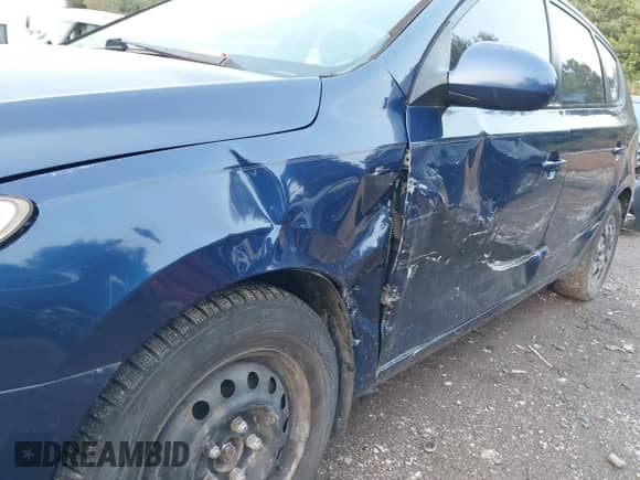 2012 Hyundai Elantra GLS z VIN KMHDB8AEXCU129926, wystawiony jako IAAI lot #43161581 z przebiegiem 185 638 mil mil oraz . Historia ofert i sprzedaży dostępna na DreamBid. Obrazek 6.