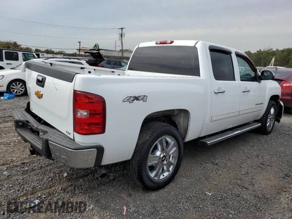 2012 Chevrolet Silverado 1500 LTZ with VIN 1GCPKTE71CF124456, listed as a Copart auction lot 83750495 with 158,377 mi miles and Salvage title. Bid and sale history available at DreamBid. Image 3.