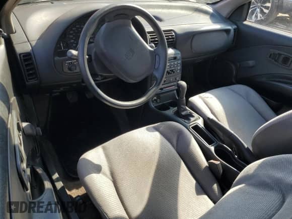 1995 Saturn SC with VIN 1G8ZE1285SZ141155, listed as a Copart auction lot 65757374 with 150,973 mi miles and Salvage title. Bid and sale history available at DreamBid. Image 8.