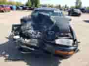 1992 Toyota Camry z VIN JT2VK12E2N0099354, wystawiony jako Copart lot #55098155 z przebiegiem 153 493 mil mil oraz Szkoda całkowita • Salvage title. Historia ofert i sprzedaży dostępna na DreamBid. Obrazek 5.