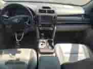 2014 Toyota Camry SE with VIN 4T1BF1FK2EU788636, listed as a Copart auction lot 68917645 with 113,900 mi miles and Salvage title. Bid and sale history available at DreamBid. Image 8.