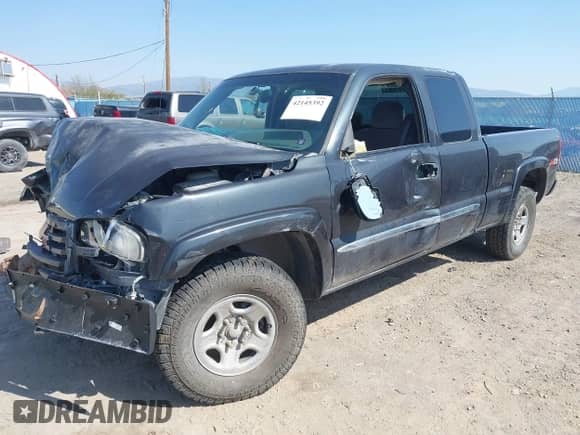 2003 GMC Sierra 1500 SLT z VIN 1GTEK19T03E191705, wystawiony jako IAAI lot #42145392 z przebiegiem Nie podano mil oraz . Historia ofert i sprzedaży dostępna na DreamBid. Obrazek 2.