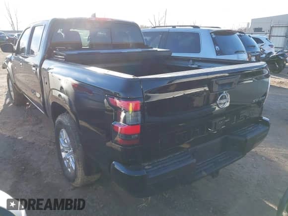 2023 Nissan Frontier SV with VIN 1N6ED1FK1PN625087, listed as a IAAI auction lot 41735642 with 30,054 mi miles and . Bid and sale history available at DreamBid. Image 3.