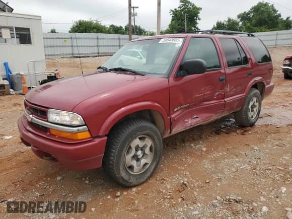 2003 Chevrolet Blazer LS with VIN 1GNDT13XX3K127135, listed as a Copart auction lot 59543605 with 183,607 mi miles and Salvage title. Bid and sale history available at DreamBid. Image 1.