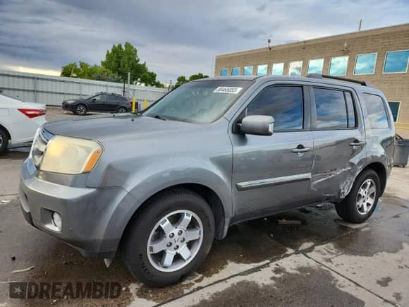 2009 Honda Pilot Touring with VIN 5FNYF38809B027002, listed as a Copart auction lot 80465055 with 90,269 mi miles and Salvage title. Bid and sale history available at DreamBid. Image 1.