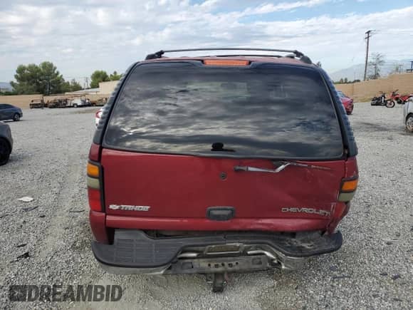 2004 Chevrolet Tahoe LS z VIN 1GNEC13V54J215424, wystawiony jako Copart lot #81526225 z przebiegiem 159 589 mil mil oraz Szkoda całkowita • Salvage title. Historia ofert i sprzedaży dostępna na DreamBid. Obrazek 6.