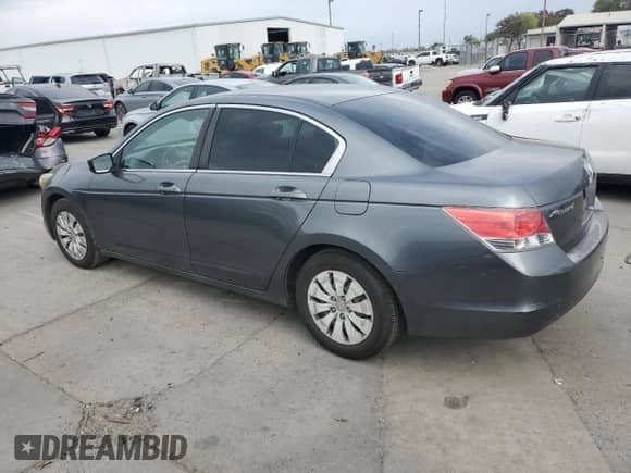 2010 Honda Accord LX with VIN 1HGCP2F31AA022267, listed as a Copart auction lot 82623695 with 323,756 mi miles and Salvage title. Bid and sale history available at DreamBid. Image 2.