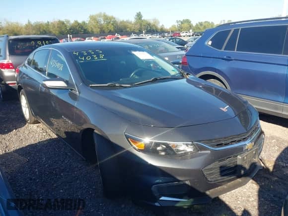 2018 Chevrolet Malibu LT z VIN 1G1ZD5ST8JF166998, wystawiony jako IAAI lot #43354038 z przebiegiem 100 794 mil mil oraz . Historia ofert i sprzedaży dostępna na DreamBid. Obrazek 1.