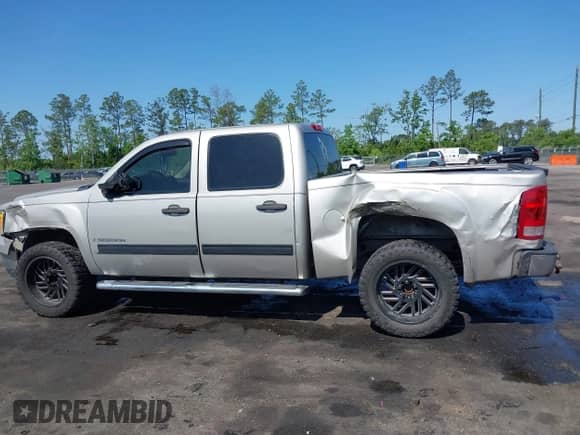 2007 GMC Sierra 1500 SLE1 z VIN 3GTEC13C37G538920, wystawiony jako IAAI lot #42188019 z przebiegiem 262 302 mil mil oraz . Historia ofert i sprzedaży dostępna na DreamBid. Obrazek 14.