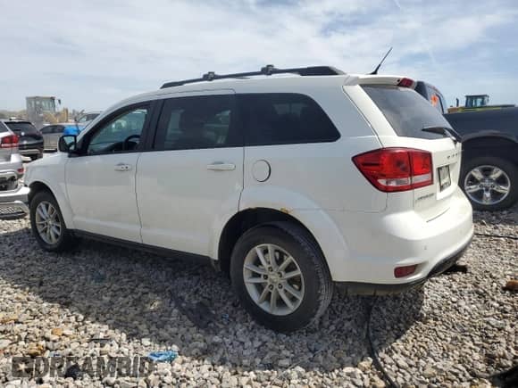 2015 Dodge Journey SXT with VIN 3C4PDCCGXFT673449, listed as a Copart auction lot 54698005 with 147,935 mi miles and Clean title. Bid and sale history available at DreamBid. Image 2.