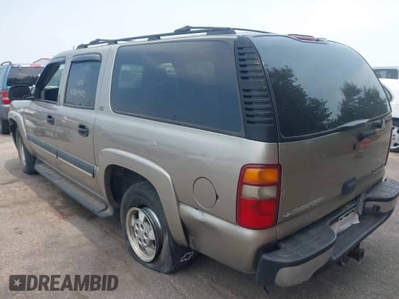 2002 Chevrolet Suburban Z71 with VIN 3GNFK16Z12G288908, listed as a IAAI auction lot 42889403 with 202,639 mi miles and . Bid and sale history available at DreamBid. Image 3.