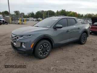 2022 Hyundai Santa Cruz SEL z VIN 5NTJB4AE2NH013716, wystawiony jako Copart lot #81901025 z przebiegiem Nie podano mil oraz Szkoda całkowita • Salvage title. Historia ofert i sprzedaży dostępna na DreamBid. Obrazek 1.