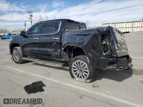 2024 GMC Sierra 1500 Denali Ultimate with VIN 1GTUUHE80RZ393736, listed as a Copart auction lot 43004125 with 5,587 mi miles and Salvage title. Bid and sale history available at DreamBid. Image 2.