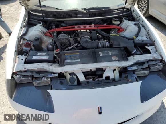 1994 Chevrolet Camaro Z28 z VIN 2G1FP22P6R2174641, wystawiony jako Copart lot #74356334 z przebiegiem 47 215 mil mil oraz Nie do naprawy • Non repairable. Historia ofert i sprzedaży dostępna na DreamBid. Obrazek 11.