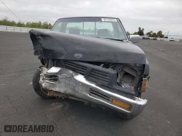 1995 Nissan Frontier z VIN 1N6SD11S5SC335661, wystawiony jako Copart lot #82740855 z przebiegiem 168 579 mil mil oraz Szkoda całkowita • Salvage title. Historia ofert i sprzedaży dostępna na DreamBid. Obrazek 5.