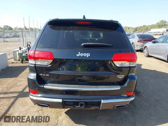 2014 Jeep Grand Cherokee Summit with VIN 1C4RJFJT4EC154815, listed as a IAAI auction lot 43209009 with 59,122 mi miles and . Bid and sale history available at DreamBid. Image 17.