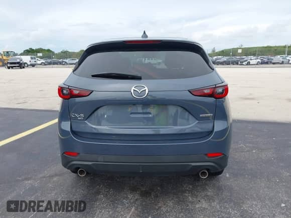 2023 Mazda CX-5 S Carbon Edition z VIN JM3KFBCM1P0132803, wystawiony jako IAAI lot #43128566 z przebiegiem 37 967 mil mil oraz . Historia ofert i sprzedaży dostępna na DreamBid. Obrazek 16.
