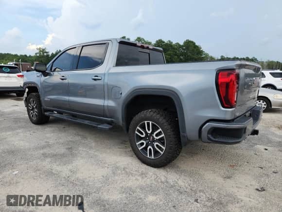 2020 GMC Sierra 1500 AT4 with VIN 3GTU9EET8LG354775, listed as a Copart auction lot 63521415 with 46,467 mi miles and Salvage title. Bid and sale history available at DreamBid. Image 2.