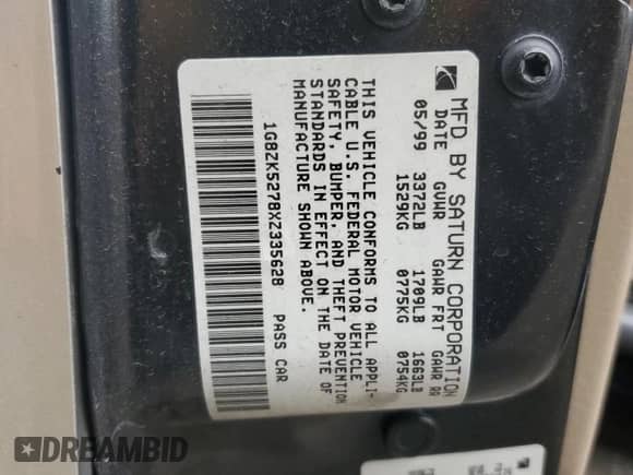 1999 Saturn SL z VIN 1G8ZK5278XZ335628, wystawiony jako Copart lot #80563955 z przebiegiem 185 590 mil mil oraz Szkoda całkowita • Salvage title. Historia ofert i sprzedaży dostępna na DreamBid. Obrazek 12.