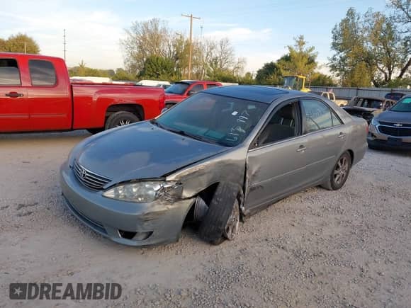 2005 Toyota Camry XLE with VIN 4T1BF30K95U613997, listed as a IAAI auction lot 43348925 with 122,617 mi miles and . Bid and sale history available at DreamBid. Image 16.