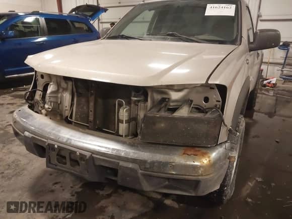 2006 Chevrolet Colorado z VIN 1GCDT148968295947, wystawiony jako IAAI lot #41624162 z przebiegiem 181 803 mil mil oraz . Historia ofert i sprzedaży dostępna na DreamBid. Obrazek 6.