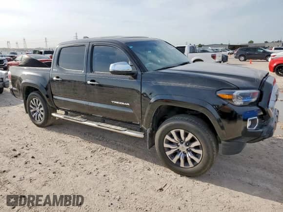 2023 Toyota Tacoma Limited с VIN 3TMEZ5CN7PM204446, выставлен на аукционе Copart как лот 67068615 с пробегом 43 738 миль миль и Списание • Salvage title. История ставок и продаж доступна на DreamBid. Изображение 4.