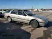 1990 Honda Accord LX with VIN JHMCB7651LC129028, listed as a Copart auction lot 82001875 with 158,454 mi miles and Salvage title. Bid and sale history available at DreamBid. Image 4.