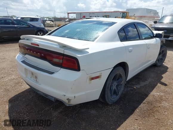 2014 Dodge Charger SE with VIN 2C3CDXBG1EH280927, listed as a IAAI auction lot 43306918 with Not provided miles and . Bid and sale history available at DreamBid. Image 4.