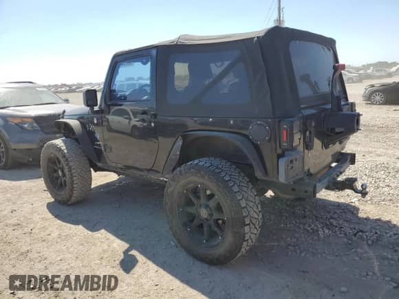 2007 Jeep Wrangler X с VIN 1J4FA24167L149456, выставлен на аукционе Copart как лот 82495595 с пробегом 119 257 миль миль и Списание • Salvage title. История ставок и продаж доступна на DreamBid. Изображение 2.