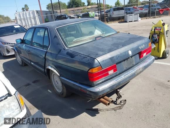 1990 BMW 7 Series with VIN WBAGC4313LDC24751, listed as a IAAI auction lot 42922461 with 221,464 mi miles and . Bid and sale history available at DreamBid. Image 3.